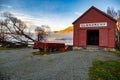 The red boat shed with low cloud and mist over Lake Wakatipu at sunrise