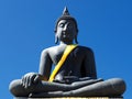 Iconic image of Lord Buddha draped in yellow robe