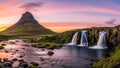 Kirkjufell mountain and waterfall at sunset with vibrant sky and river Royalty Free Stock Photo