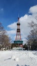 Iconic Landmark Sapporo TV Tower surrounded by snow in Odori park, Japan