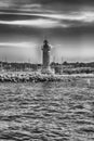 Iconic lighthouse in the harbor of Saint-Tropez, Cote d`Azur, France Royalty Free Stock Photo