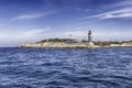 Iconic lighthouse in the harbor of Saint-Tropez, Cote d`Azur, France Royalty Free Stock Photo