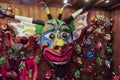 Iconic masks and mannequins wearing costumes from Yare Devils dancing Corpus Christi in a souvenir shop in Venezuela in El Hatillo