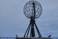 iconic monument of a steel globe at North cape in Norway