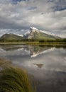 Iconic Mount Rundle reflected in Vermilion Lakes. Banff. Canadian Rockies. Vertical format