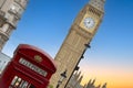 The iconic old British red telephone box with Big Ben in the background in central London Royalty Free Stock Photo