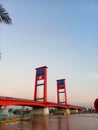 Iconic Red Ampera Bridge Over the Musi River Royalty Free Stock Photo