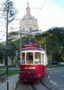 Iconic red Lisbon tram car at the Estrela stop, Lisbon, Portugal Royalty Free Stock Photo