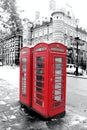 Iconic Red Phone Booth with black and white background in London Royalty Free Stock Photo