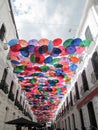 Iconic roof made with multicolored umbrellas from the Linares passage, located between Universidad Avenue and El Venezolano Square