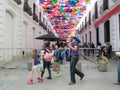 Iconic roof made with multicolored umbrellas from the Linares passage, located between Universidad Avenue and El Venezolano Square