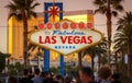 Iconic Sign Welcome to Fabulous Las Vegas in Nevada crowded by people waiting in a long line to pose with the sign