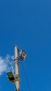Iconic Solar Powered Street Light on The Lamp Post with Beautiful Blue Sky and Partly Clouds as The Background. Royalty Free Stock Photo