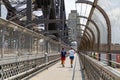 Sydney Iconic Harbor Bridge with joggers and runners on the bridge, Sydney New South Wales Australia