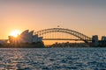 Iconic Sydney Opera HOuse and Sydney Harbour bridge on sunset Royalty Free Stock Photo