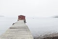 Traditional red colored wooden fishing stages Royalty Free Stock Photo