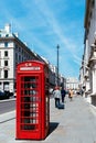 Iconic traditional red telephone box in London