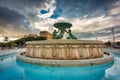 Iconic Triton fountain in front of the City Gate to Valletta, capital of Malta