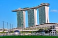 Iconic view of Marina Bay Sands and Shoppes mall in Marina bay on sunny day. Famous landmarks of Singapore city-state.
