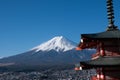 The iconic view of Mount Fuji with the red Chureito pagoda and Fujiyoshida city from Arakurayama sengen park in Yamanashi Royalty Free Stock Photo