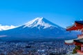 The iconic view of Mount Fuji with the red Chureito pagoda and Fujiyoshida city from Arakurayama sengen park in Yamanashi Royalty Free Stock Photo