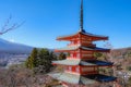 The iconic view of Mount Fuji with the red Chureito pagoda and Fujiyoshida city from Arakurayama sengen park in Yamanashi Royalty Free Stock Photo