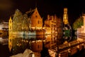 Iconic view of night Brugge in Belgium. Touristic poster. Royalty Free Stock Photo