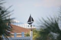 The weather vane is symbolic of living on the beach Royalty Free Stock Photo