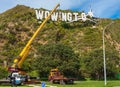 Iconic "swoosh Wellington" modified sign to Wowington to celebrate the "wow" festival