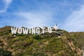 Iconic "swoosh Wellington" modified sign to Wowington to celebrate the "wow" festival