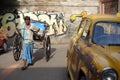 The iconic yellow ambassador taxi Kolkata and a hand pulled rickshaw