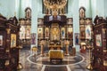 the iconostasis in the Orthodox Church decorated with wood and gold Royalty Free Stock Photo