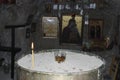 Icons in the chapel in the rock. Greece, Crete Royalty Free Stock Photo