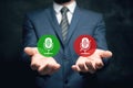 icons of enabled and disabled microphone. Man holding in his hand Royalty Free Stock Photo