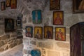 Icons hang on the wall in the monastery of Gerasim Jordanian - Deir Hijleh - in the Judean desert near the city of Jericho in Royalty Free Stock Photo