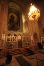 Icons and murals on the walls inside the Svetitskhoveli in Mtskheta, Georgia.