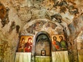 Icons in Old Orthodox Church Crypt, Saint Theodora Church, Peloponnese, Greece Royalty Free Stock Photo