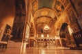 Icons and tall walls of old church with sanctuary and frescoes at the Shio-Mgvime monastery Royalty Free Stock Photo