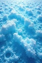 Icy blue geometric patterns on a frozen surface , winter, glacier Royalty Free Stock Photo