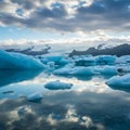 Icy Blue Icebergs Reflecting Clouds in Glacial Lake Royalty Free Stock Photo