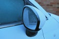 Icy car mirror Royalty Free Stock Photo