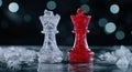 Icy chess pieces on reflective surface Royalty Free Stock Photo