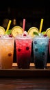 Icy fruit slushies stand united in plastic cups, forming a chilly lineup