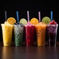 Icy fruit slushies stand united in plastic cups, forming a chilly lineup