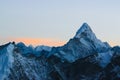 Icy Mount Amadablam of Himalaya, Nepal in fading daylight