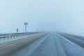 Icy road with ice and snow fog. M4 highway don 788 km untreated from ice