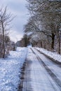 Icy road through a winter landscape Royalty Free Stock Photo