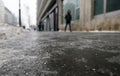 Icy sidewalk on a cold winter day Royalty Free Stock Photo