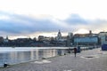 The icy Stockholm ferry dock of Gamla Stan in the winter, facing Sodermalm, Stockholm, Sweden.