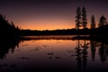 Bench Lake Sawtooths sunset with Silhouette forest reflection Royalty Free Stock Photo